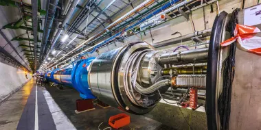 As a research infrastructure, CERN enables scientists from around the world to conduct cutting-edge research in particle physics. This is the Large Hadron Collider tunnel. (Credit: Maximilien Brice/CERN)