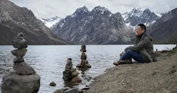 Huai Chen beside glacial lake on Tibetan Plateau