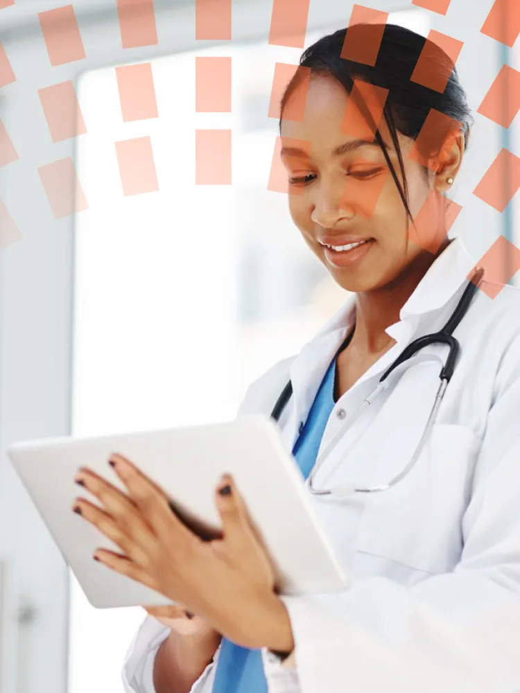 Young doctor using a digital tablet in a hospital