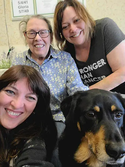 Jill Mottorn with her mom, Loreen, cousin Jennifer and dog, Chunk.