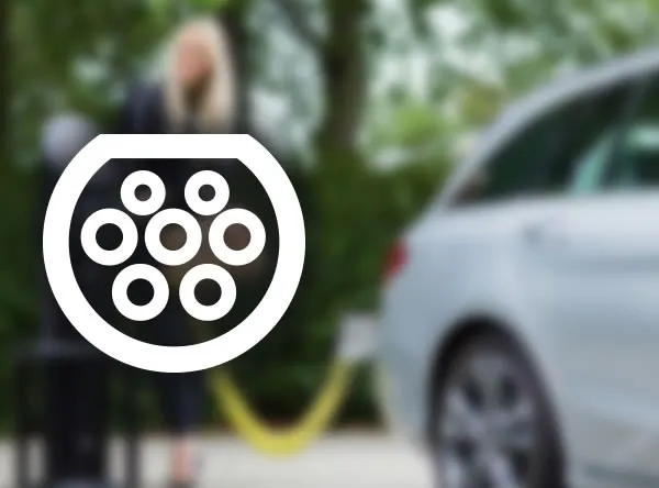 An image of a Type 2 electric car connector/socket.