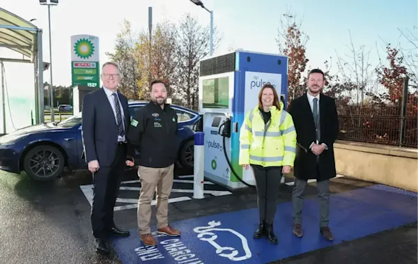 Stephen Hamilton and Ron Whitten from Henderson Group join Easton Boyd and Ailsa Wilkins from bp at one of the new bp pulse electric vehicle charging points.