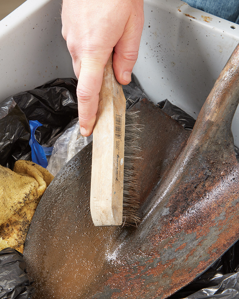 Cleaning rust off shovel