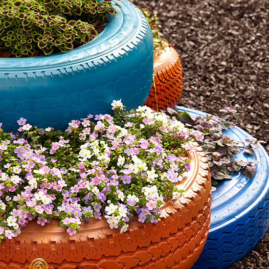 Painted tire planters: Stacked tires painted fun colors make for unexpected planters.