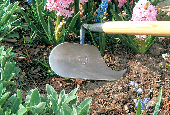 Multi-purpose garden hoe: This multi-purpose garden hoe has a unique curved blade and sharp point.