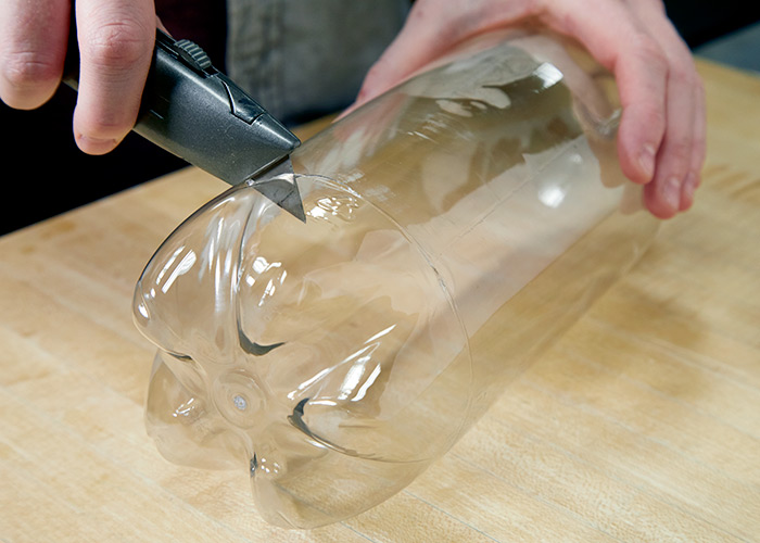 soda-bottle-cloche-remove-bottom-of-2-liter-bottle: Remove the bottom of the 2-liter bottle just above the “feet.”