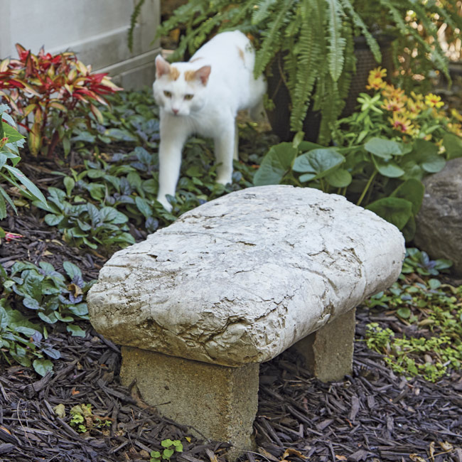 GG168-concrete-bag-project-bench: This concrete mix bag absorbed moisture and rain outdoors over time, leaving its texture a bit rough.