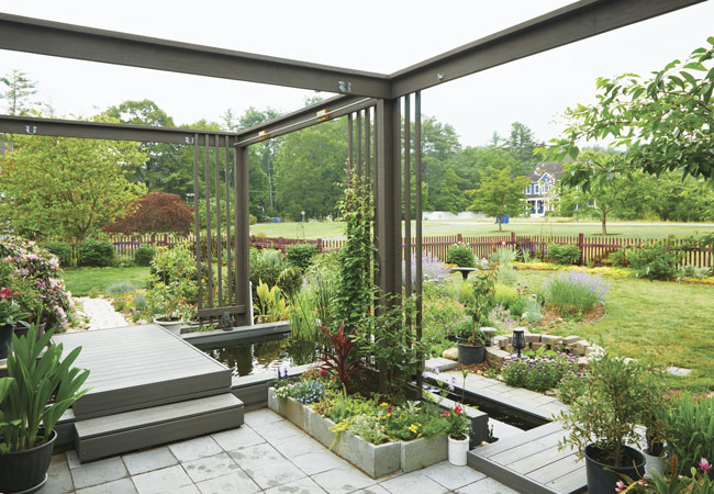 174-FG-reader-garden-winners-koi-pond-bridge: Philip Zhao designed and built all the structures in the garden.