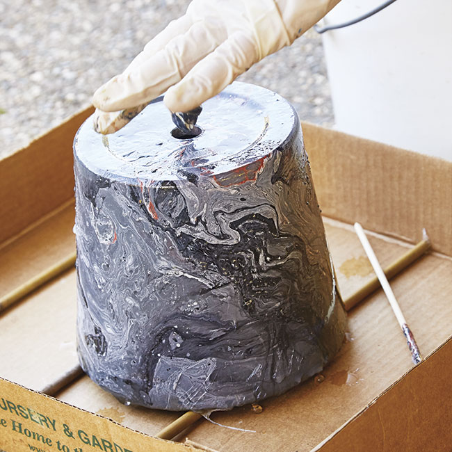 drying-marbleized-pot: Witness the marbled magic and set out to dry.