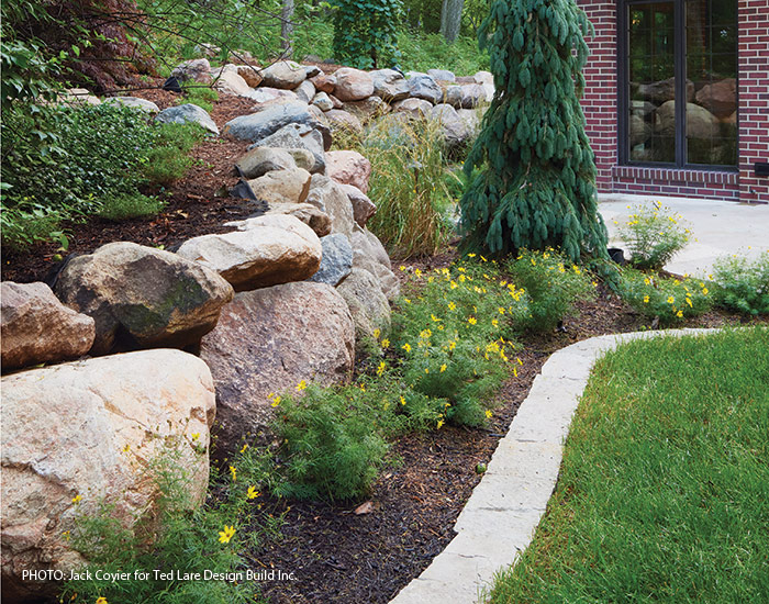 Natural Stone Garden edging photo by Jack Coyier: Keegan Lare prefers natural stone edging for its appearance and durability in Midwest gardens.