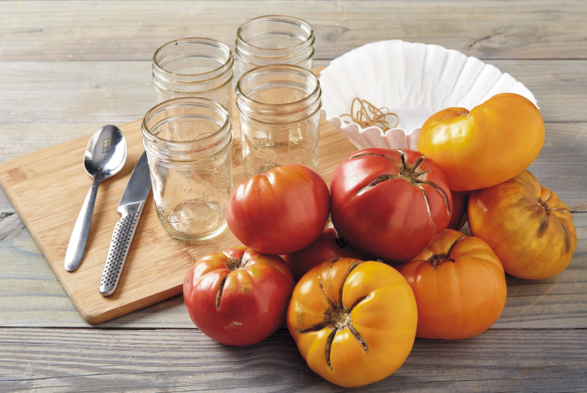 v-t-seed-fermentation-1: Here you see Brandywine Pink & Brandywine Yellow tomatoes along with the supplies you will need to save their seeds.