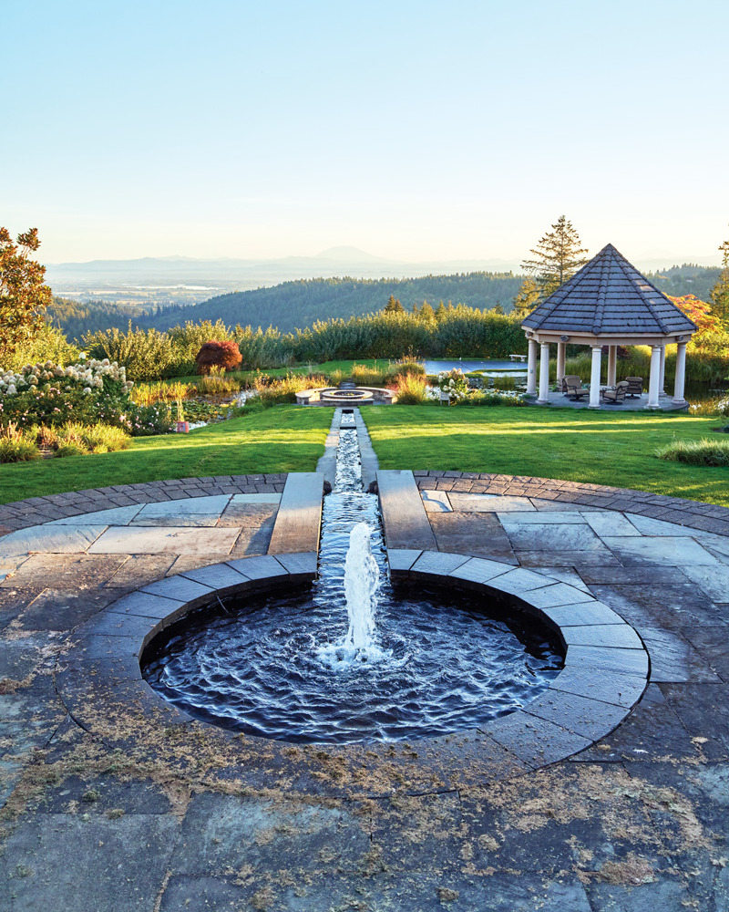 GG184 Lisa Graff Feature Garden fountain view vertical: This amazing panorama that includes Mount St. Helens isn’t the only attraction in Lisa Graff’s backyard. 