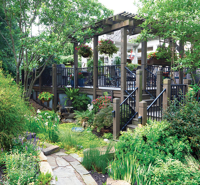 Bonnie Duma Patio: This 625-square-foot raised deck is the heart and soul of this garden, and serves as the central point connecting all paths. 