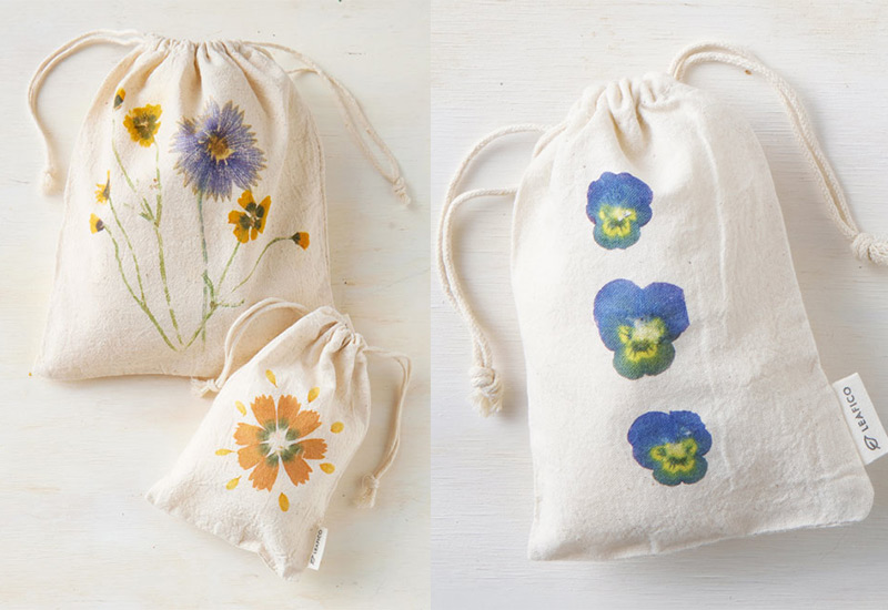 Flower pounding fabric bags with pansies and other flowers: Preserve blooms from your garden by creating unique bags with the flower pounding technique.