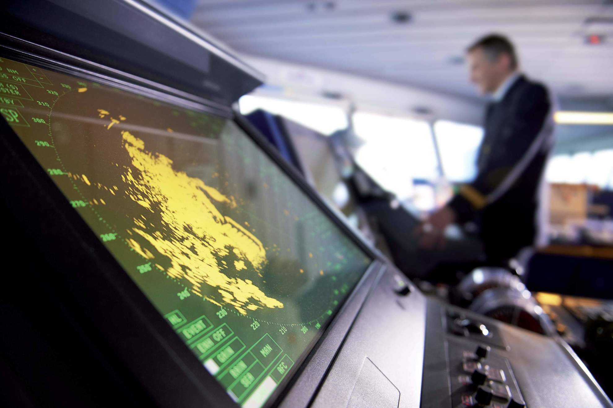 On board the bridge with captain in the background