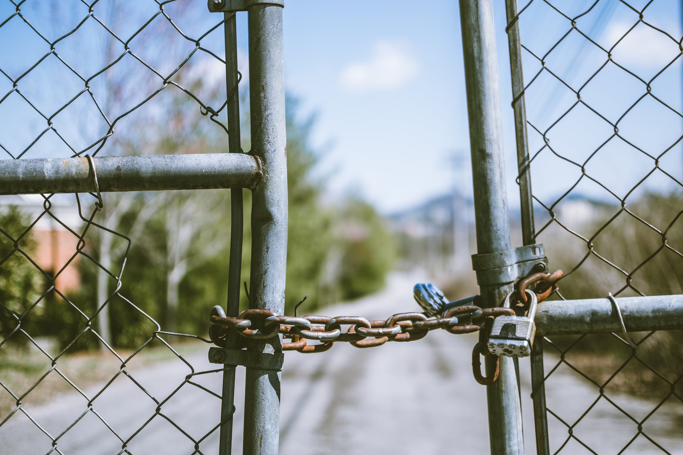 Photo of a fence locked with a chain