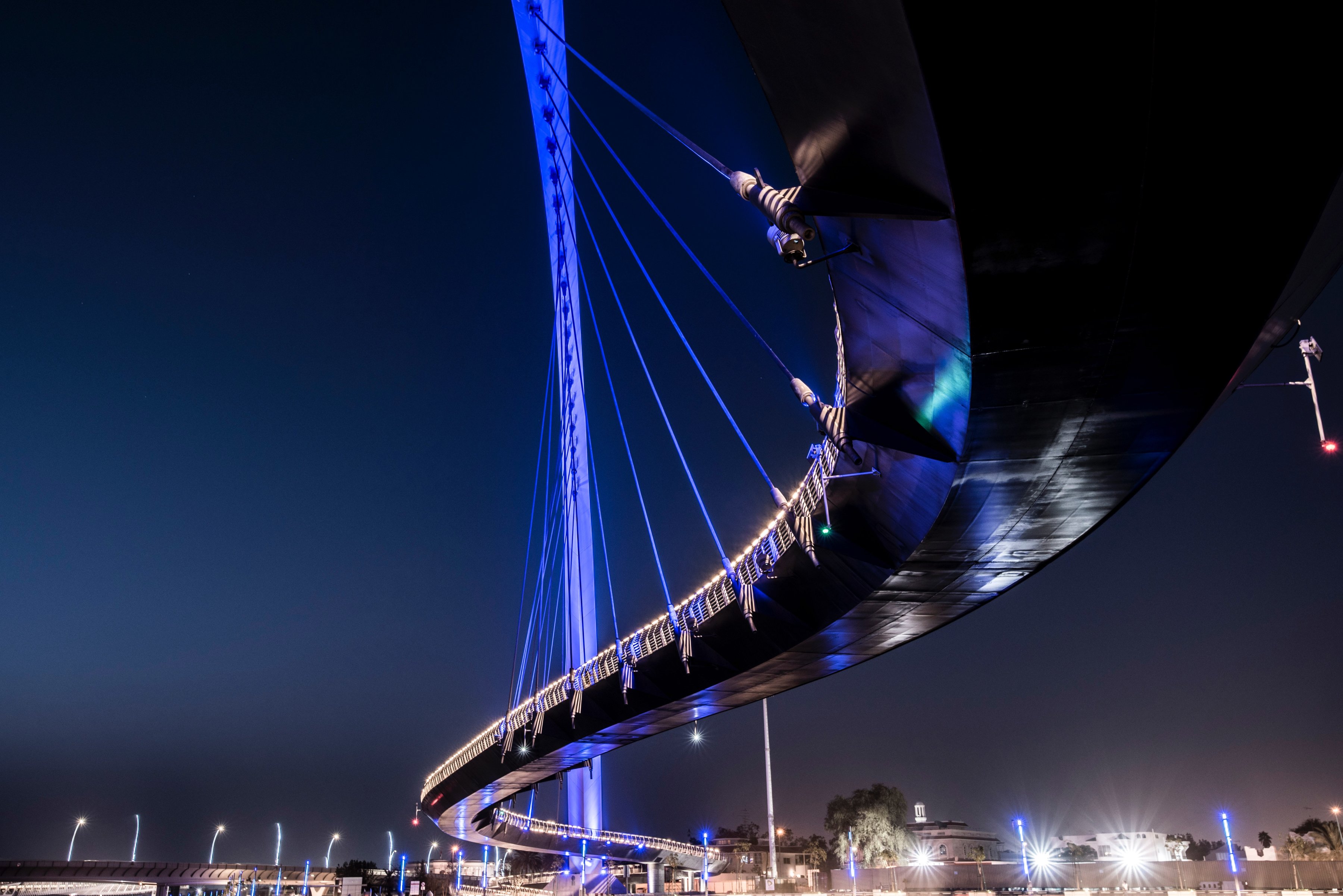 Sleek underside of a bridge at night