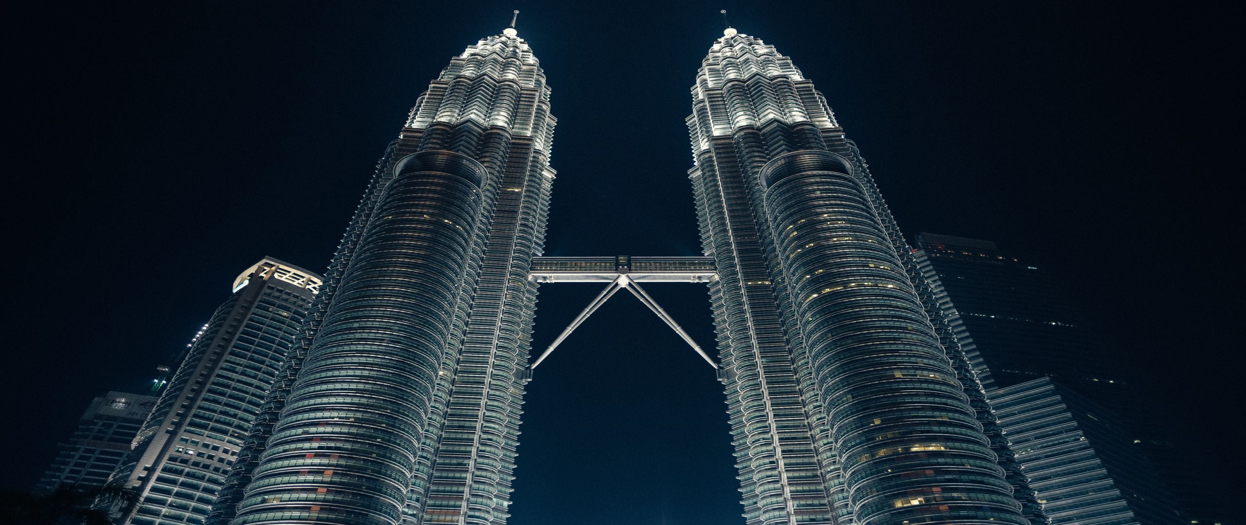 Image of twin building towers at an oblique angle