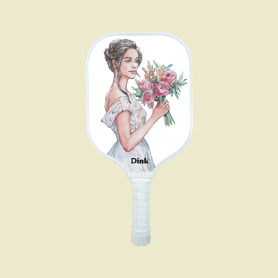 Dink´s custom pickleball paddle with the bride’s cartoon print as a bachelorette party gift