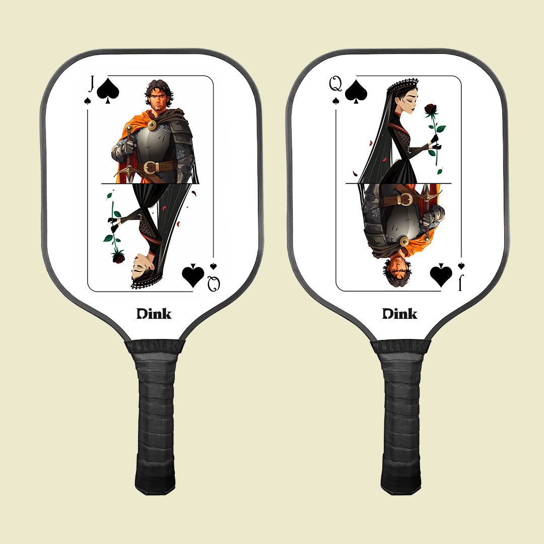 A set of custom pickleball paddles from Dink featuring a queen and knight on the playing cards