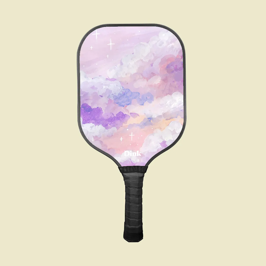 Watercolored dream patterns on the custom pickleball paddle from Dink