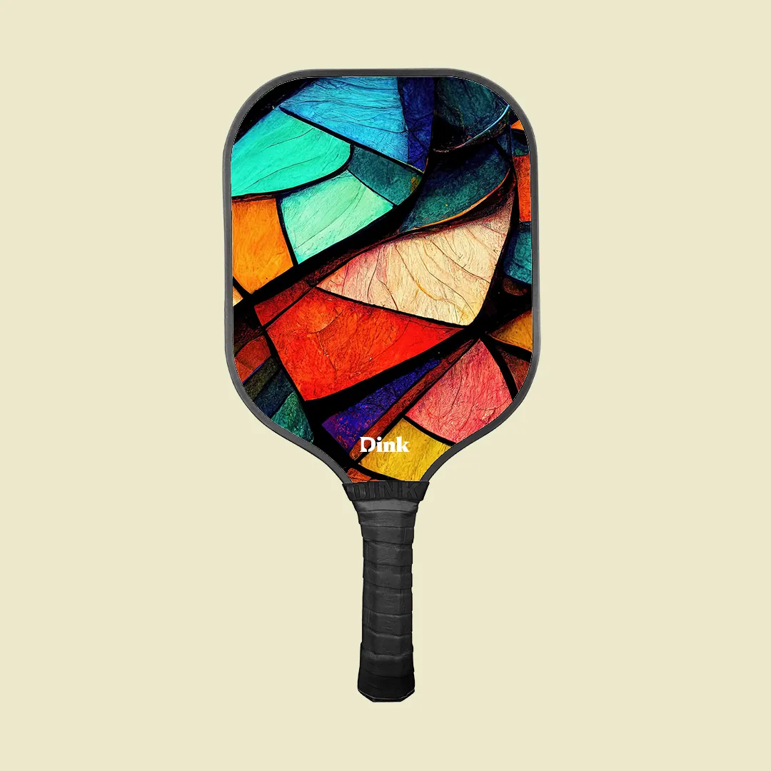 Bold & colorful abstract patterns on a custom pickleball paddle from Dink