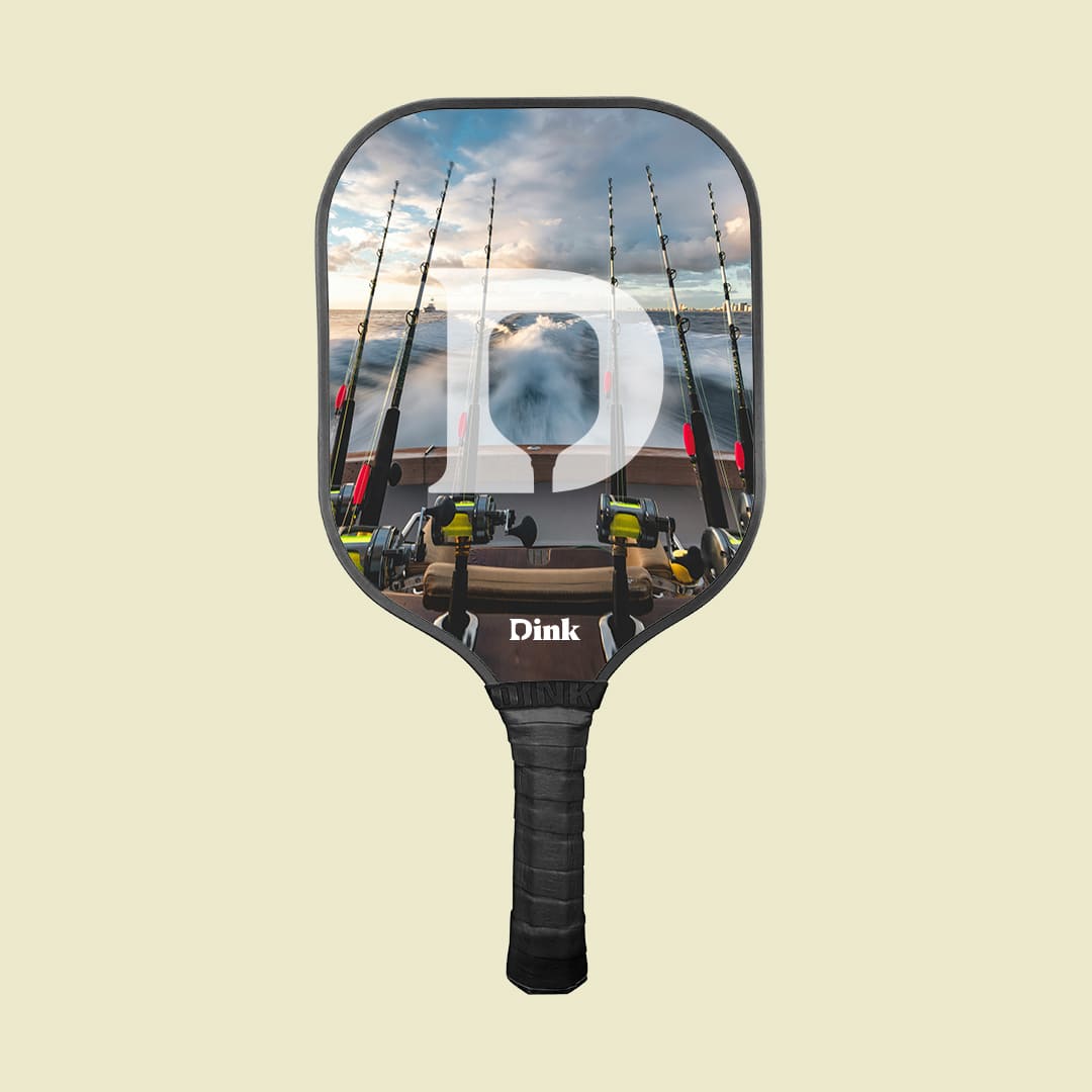 A custom picklelball paddle featuring a fishing gear 