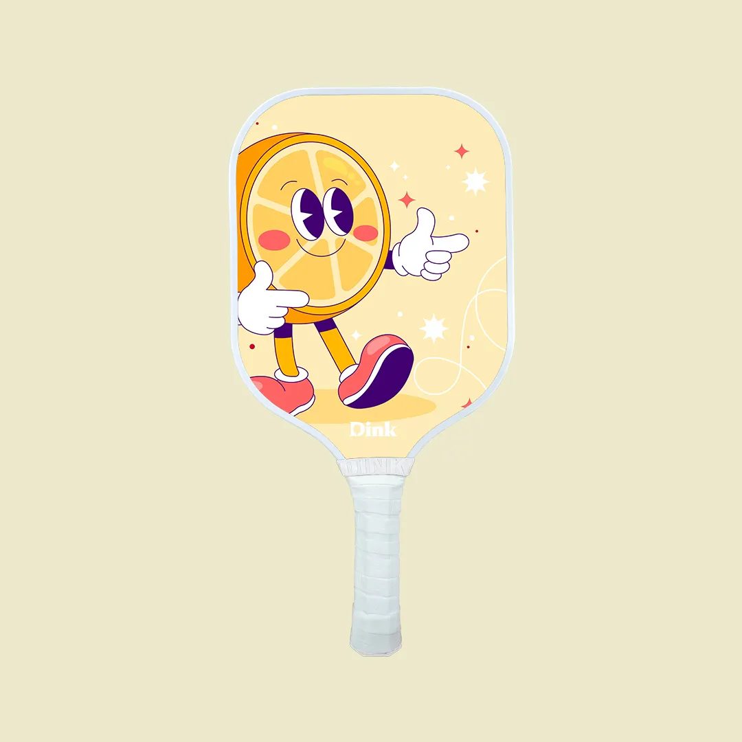 a custom pickleball paddle from Dink with a yello cartoon lemon