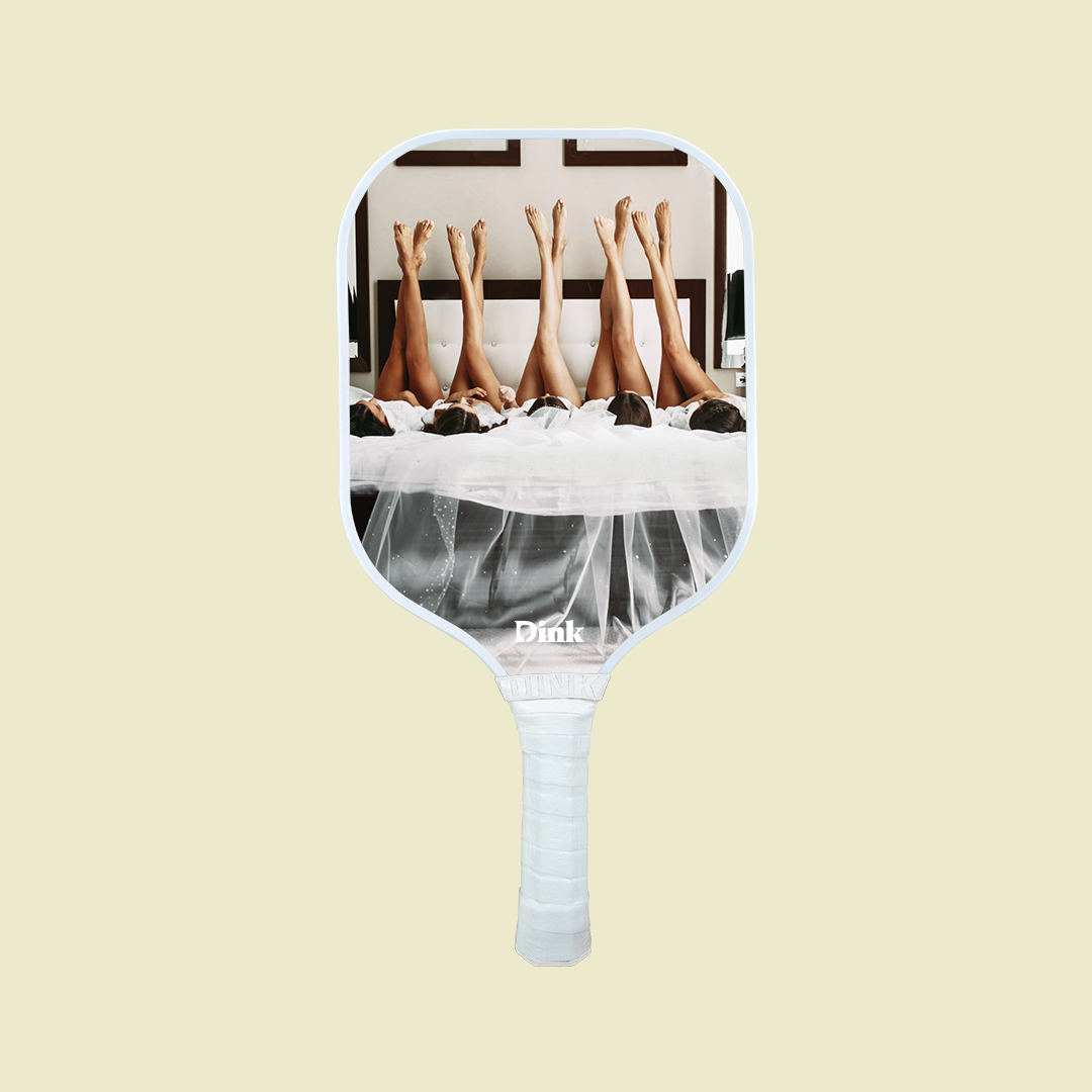 Dink´s custom pickleball paddle with bride’s and bridesmaids print as a bachelorette party gift