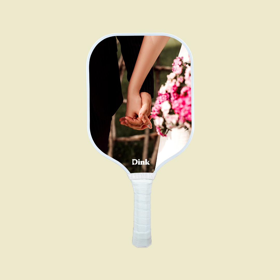 Dink´s custom pickleball paddle with bride and groom print as a bachelorette party gift