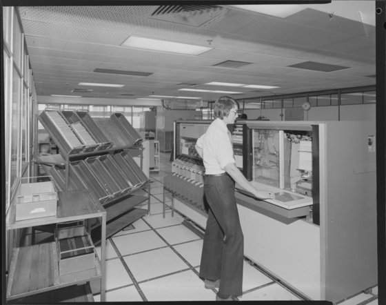 Man Operating A Computer