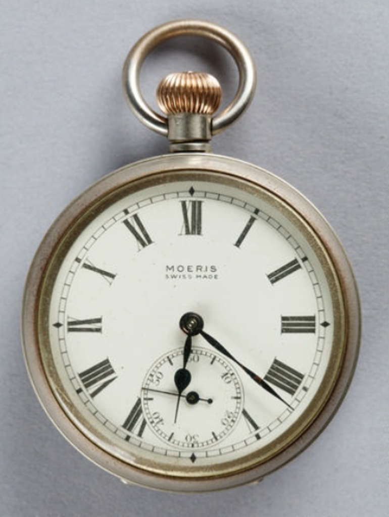 Silver and rose gold pocket watch with Roman numerals.