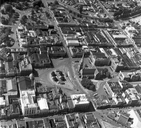 Black and white aerial photo of a city.