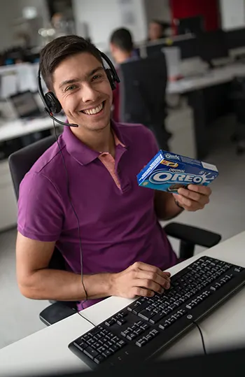 Internship - Man smiling with Oreo snack
