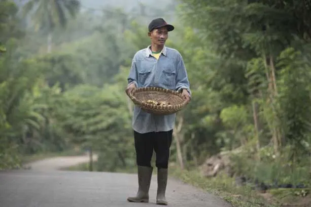 man holding basket