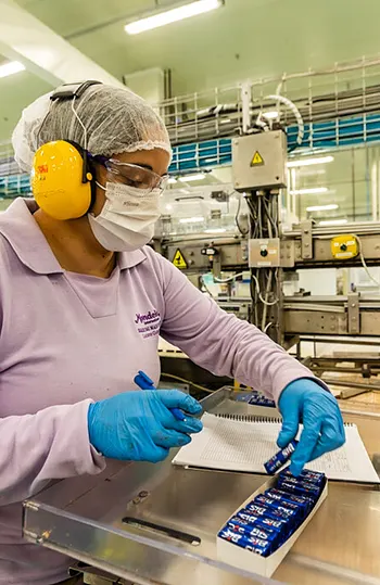 female employee controling packaging