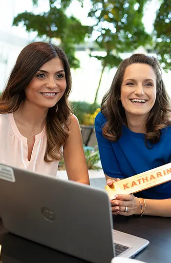 Two ladies with chocolate bar