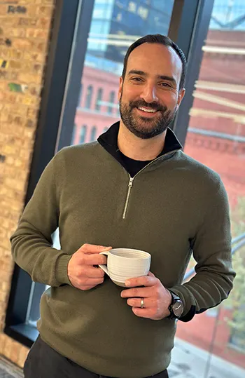 Finance male employee smiling