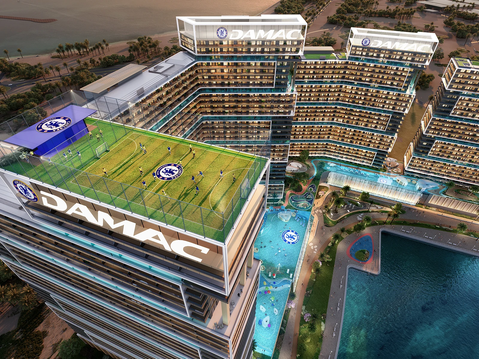 Rooftop football pitch with Chelsea FC crest, aerial view of waterfront