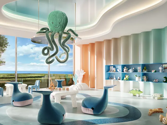 Entrez dans un monde vibrant inspiré d’un aquarium, où les rires remontent et l’imagination coule librement près de la piscine.