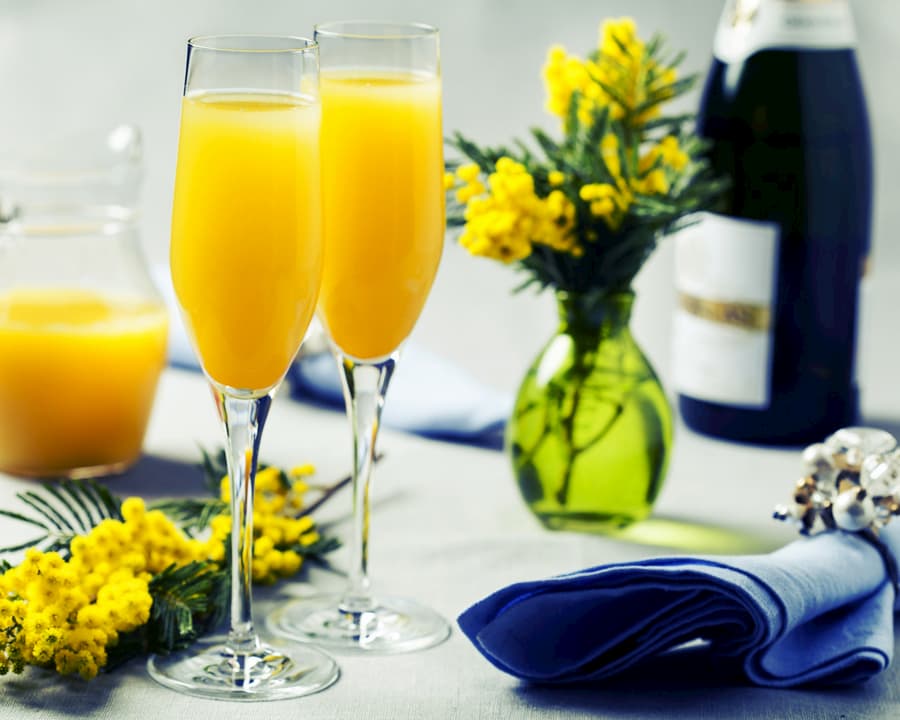 Mimosa Party for Two: two splits of Brut sparkling wine served with an  array of mixers, featuring orange juice, hibiscus syrup, and…