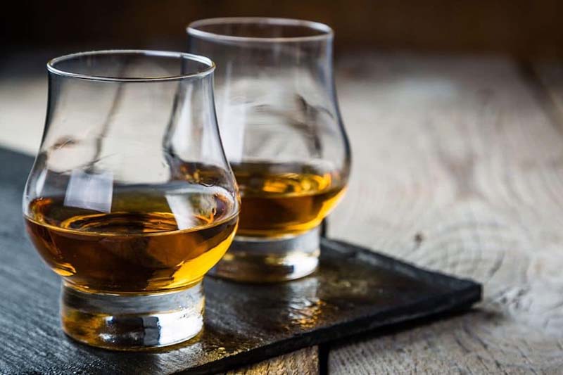 Guide To Whiskey Investment: 10 Best Bottles, Expert Tips