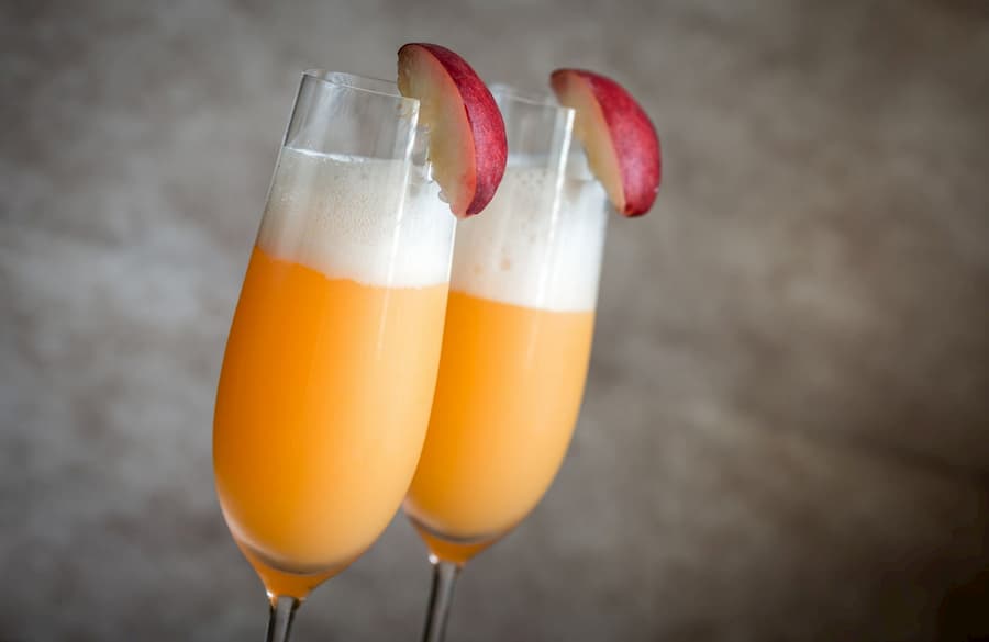 Mimosa Party for Two: two splits of Brut sparkling wine served with an  array of mixers, featuring orange juice, hibiscus syrup, and…