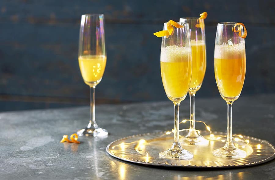 Mimosa Party for Two: two splits of Brut sparkling wine served with an  array of mixers, featuring orange juice, hibiscus syrup, and…