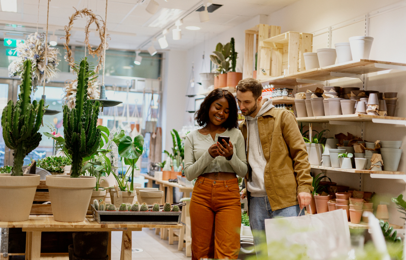 A young couple in a flower shop