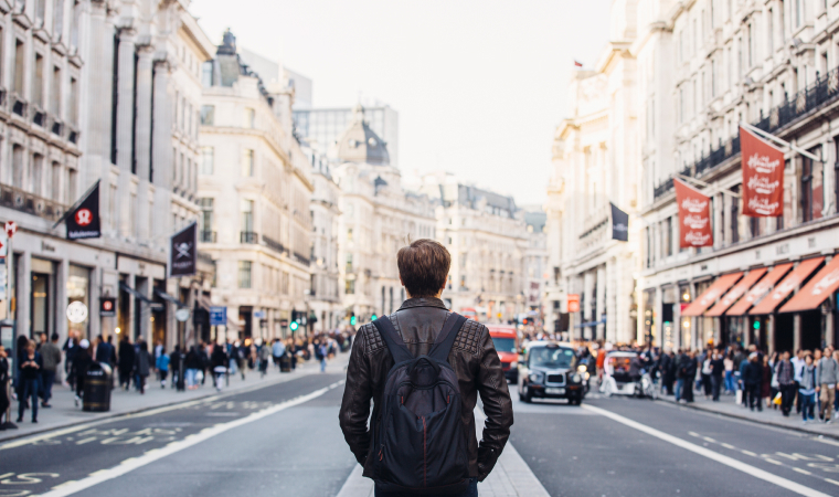 A man standing in a street in London