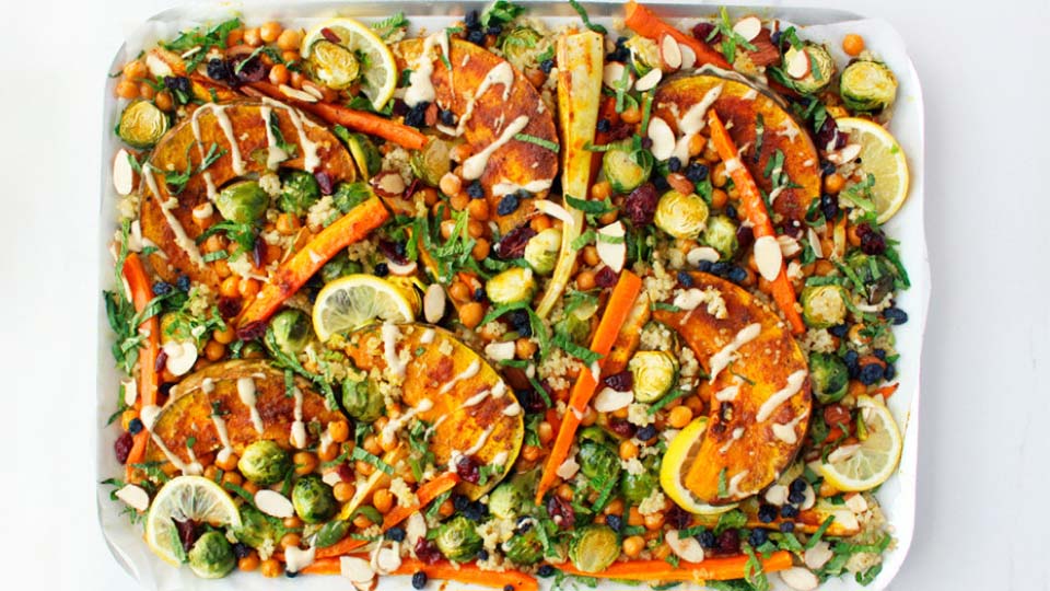 Overhead photo of Moroccan one-pan dinner with vegetables.