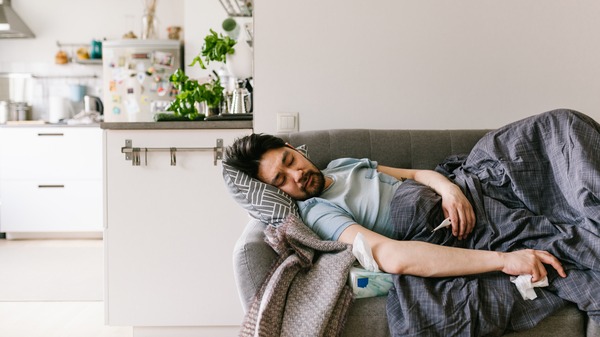 Person sleeping on their lounge.