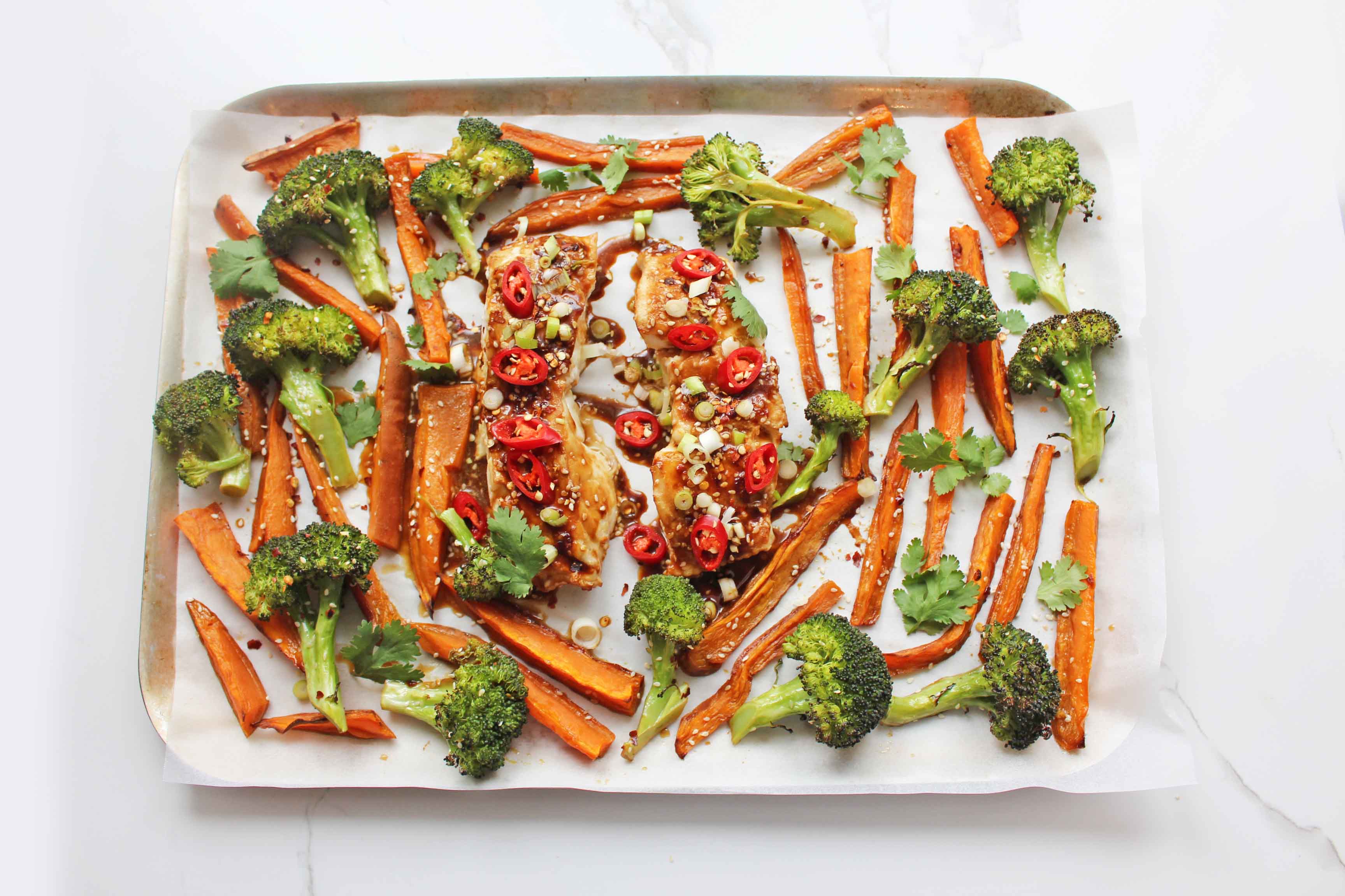 Jessica Sepel's One Pan Asian Snapper with Sesame Sweet Potato & Broccoli