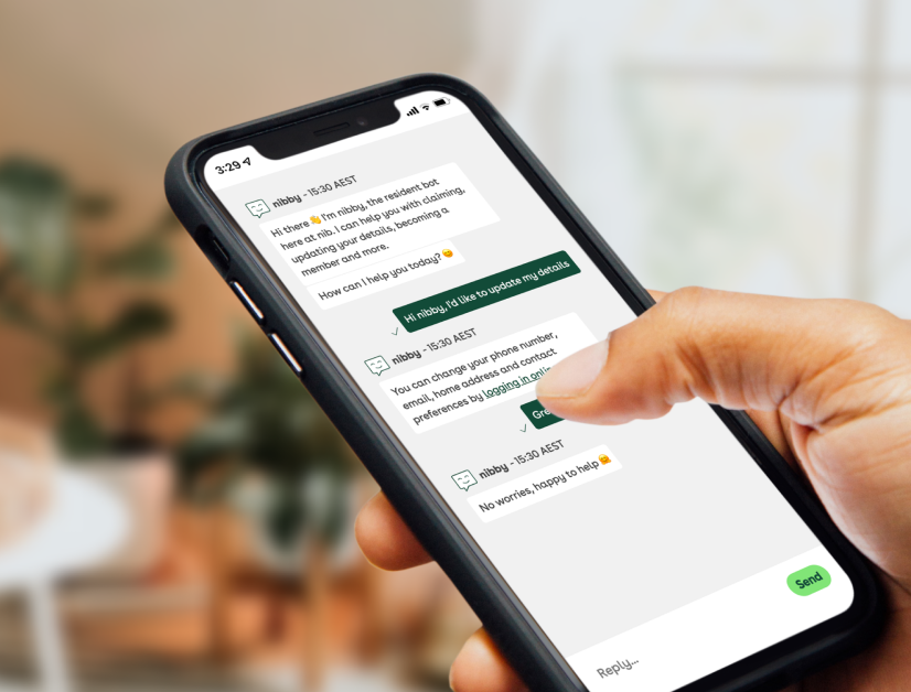 Close up shot of a hand, interacting with nibby chatbot on their phone